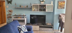 A television and/or entertainment centre at Xeraco Beach Alma