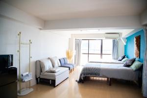 Postel nebo postele na pokoji v ubytování S19新宿最中心 東新宿站5分-Shinjuku center 5 mins to Station, Max 6P 直达新宿 涉谷 表参道 池袋 上野 代代木 银座 原宿