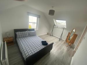 Postel nebo postele na pokoji v ubytování Téach Cara - 5 Bedroom - Culdaff