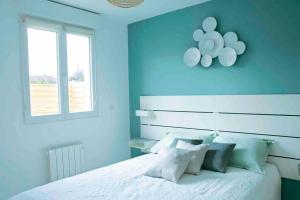 Ένα ή περισσότερα κρεβάτια σε δωμάτιο στο Appartement 5min aéroport CDG