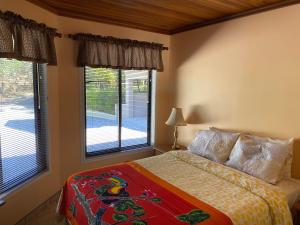 Ένα ή περισσότερα κρεβάτια σε δωμάτιο στο Villa Magallanes