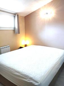 Posteľ alebo postele v izbe v ubytovaní Appartement T2 Argelès plage