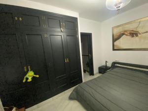Säng eller sängar i ett rum på Habitacion privada en un dúplex