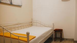 Säng eller sängar i ett rum på Sylvias Ferienwohnung Nr.4 (Souterrain)