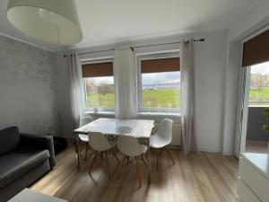 Posedenie v ubytovaní Apartament Ogrody