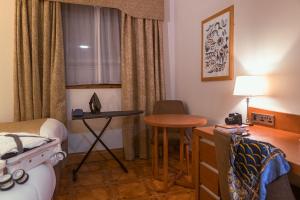 Voodi või voodid majutusasutuse Uppercross House Hotel toas