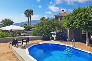 Het zwembad bij of vlak bij Ferienhaus für 4 Personen ca 145 qm in Las Manchas, La Palma Westküste von La Palma