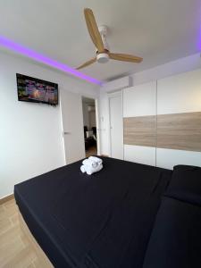 Hany apartment Tropic mar 18-C客房内的一张或多张床位