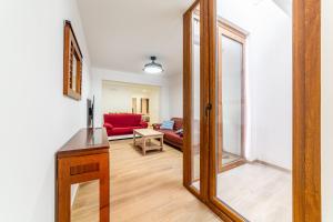 Posezení v ubytování Casa Gómez, parking gratuito en Pleno Centro + 15 fotografií