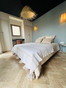 Postel nebo postele na pokoji v ubytování Smala Beldi Guest House