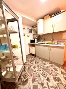 Apartamento no bairro alto 58にあるキッチンまたは簡易キッチン