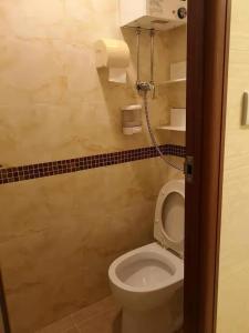 O baie la Jinnsti Guesthouse 景士迪宾馆
