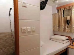 Baðherbergi á Jinnsti Guesthouse 景士迪宾馆 +37 myndir