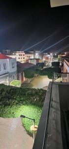 a view of a park with a bench on a roof at Seahawk Plateau 3A Apt on Rua Pedonal Praia Cape Verde in Praia