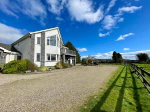 a house on the side of a road at Lackandarralodge large 5BR entire house sleeps14! in Dungarvan