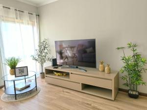 Et tv og/eller underholdning på Praia de Vila do Conde com vista a mar