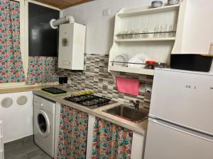 Kuchyň nebo kuchyňský kout v ubytování Suites Florence