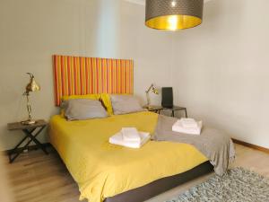 En eller flere senge i et værelse på Praia de Vila do Conde com vista a mar