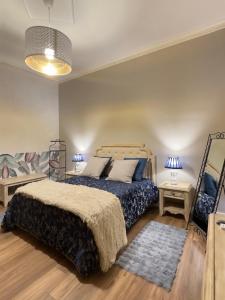 Ένα ή περισσότερα κρεβάτια σε δωμάτιο στο Al Borgo Apartment