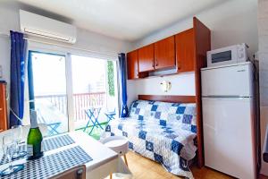 Kuchyňa alebo kuchynka v ubytovaní Appartement Vue Mer - Albatros
