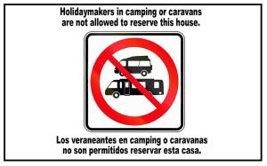 a sign with a sign that says helicopters in camping or caravanams are not allowed at Stone Cottage La COMPOSTELANA in Curtis