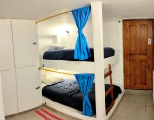 Letto o letti in una camera di Minka Hostel