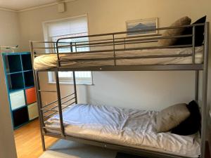 Postel nebo postele na pokoji v ubytování Ronningen Villa