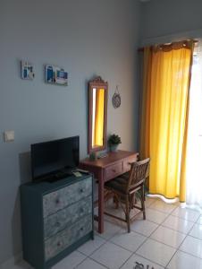 TV a/nebo společenská místnost v ubytování Marilena Studio Plataria