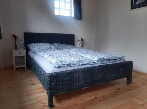 a bed sitting in a room with a mattress at Ferienwohnung auf dem Land in Ladbergen