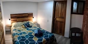 Letto o letti in una camera di Minka Hostel