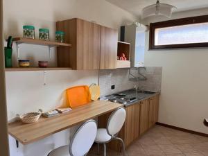 Kuchyň nebo kuchyňský kout v ubytování Residence Contessa Casalini