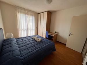 En eller flere senger på et rom på Residence Contessa Casalini