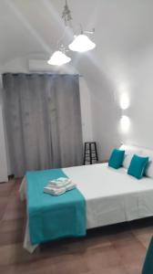 Кровать или кровати в номере Perla Marina Casa vacanze