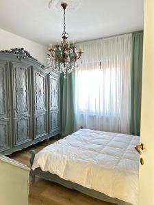 Postel nebo postele na pokoji v ubytování Casa di Maya