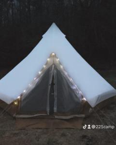 a tent that is lit up in the dark at Living at the Bell Tent in Turtletown