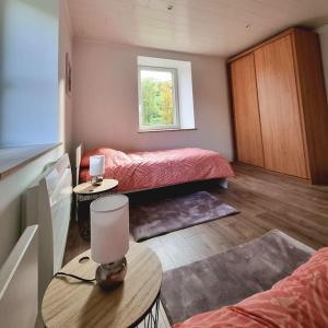 Postel nebo postele na pokoji v ubytování Appartement chaleureux 80m2