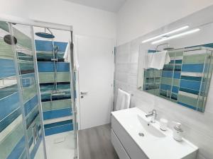 Vonios kambarys apgyvendinimo įstaigoje Ocean-Group Apartment Ipazia