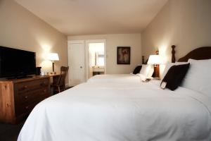 Ένα ή περισσότερα κρεβάτια σε δωμάτιο στο Inverary Resort