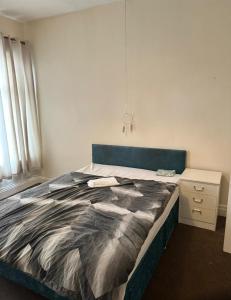 Ένα ή περισσότερα κρεβάτια σε δωμάτιο στο Mortiara