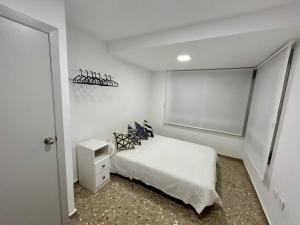 Posteľ alebo postele v izbe v ubytovaní Light in Vila-real, piso céntrico con oficina
