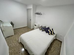 Posteľ alebo postele v izbe v ubytovaní Light in Vila-real, piso céntrico con oficina