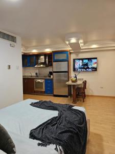 Η κουζίνα ή μικρή κουζίνα στο Cómodo Estudio ubicación Premium a una cuadra de la vela y de la playa