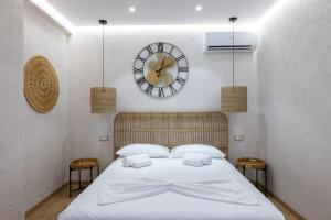 Postel nebo postele na pokoji v ubytování Boho Central Apartment