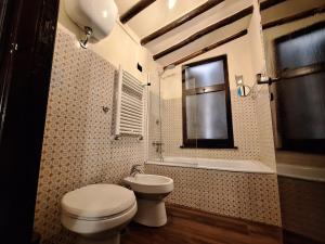 Kúpeľňa v ubytovaní OlimpiApartment