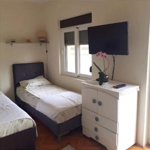 Postel nebo postele na pokoji v ubytování Guesthouse Gavrilović 28 A