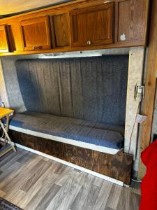 a couch in the back of an rv at Black castle RV2 in Miami