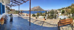 a balcony with a view of the water at Panorama Studios & Apartments in Myrties