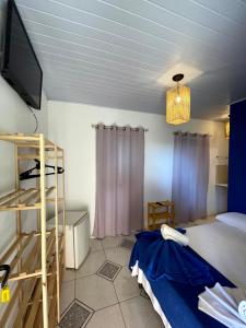 Postel nebo postele na pokoji v ubytování Pousada Vila Nativa