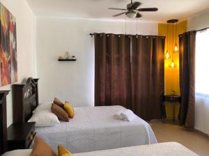 Posteľ alebo postele v izbe v ubytovaní Hermosa Habitación Independiente BNB