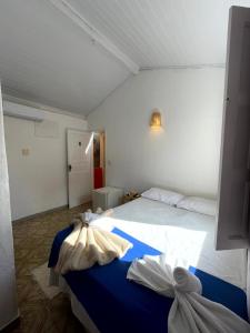 Postel nebo postele na pokoji v ubytování Pousada Vila Nativa